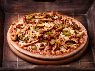 Gyros Pizza with jalapeno pepper and mozzarella cheese. Soft focus. Close up.	