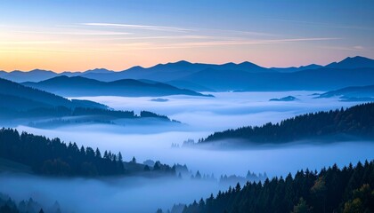 Fototapeta premium Foggy mountain valley enveloped in dusky blue tones, distant peaks fading into a peaceful, silent skyline