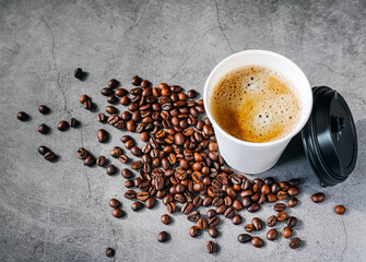Coffee crema espresso in paper Coffee cup and bean on gray background, Top view of Espresso in  Takeaway paper coffee cup