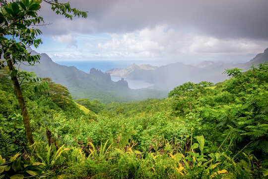 Nuku Hiva Rainy Clouds Landscape with Mountains and Green nature. Marquesas Islands, French Polynesia
