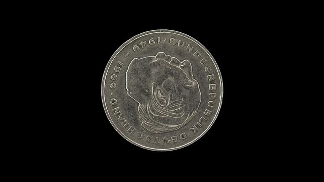 Germany 2 Deutsche Mark obverse with portrait of Theodor Heuss, macro loop on black background