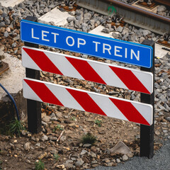 Warning sign for trains, at Central station The hague, Netherlands. June 4, 2025