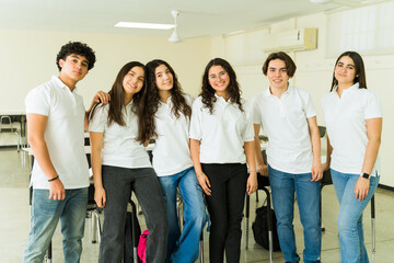 Fototapeta premium High school students enjoying classroom break together