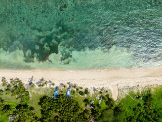 Corals and clear water in beach. Carabao Island. Romblon. Philippines.