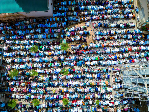 Aerial view of thousands of worshippers gather for Eid prayer in a vibrant display of faith and community at Dan Fodio Mosque in Unguwan Sunusi, Kaduna, Nigeria.