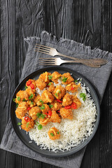 panko-breaded chicken bites with rice and sauce
