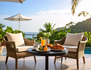 Śniadanie na tarasie: croissant, sok pomarańczowy, owoce