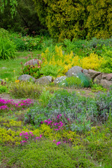 Vibrant flowers in bloom create a stunning display in the beautiful garden
