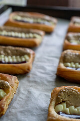 Puff pastry tarts with cream cheese, cherry jam, peanut butter. Dessert. pastry