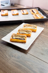 Puff pastry tarts with cream cheese, cherry jam, peanut butter. Dessert. pastry