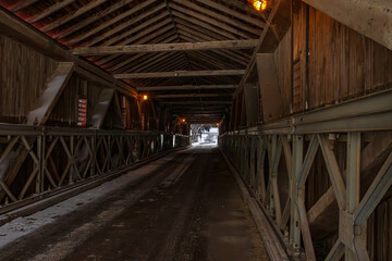 The West Montrose Covered Bridge (also known as the Kissing Bridge) during the winter, near Christmas, Waterloo, ON, Canada.