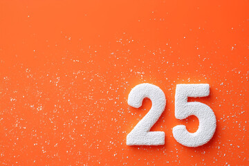 Chiffre 25 en blanc texturé sur fond orange vif avec flocons blancs épars, concept d'anniversaire, date ou célébration
