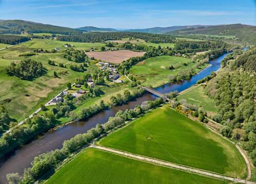 aerial view of the forest and pasture landscape at Spey River in eastern Scotland, UK
