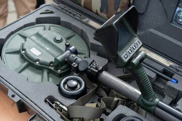 Military bomb disposal equipment displayed for training during a defense exhibition in a secure...