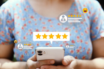 A person holding a smartphone with floating icons of five-star ratings and customer reviews, symbolizing positive feedback, user satisfaction, and digital engagement through mobile platforms.