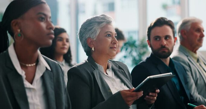 Mature business woman, raised hand and audience with question, tablet or feedback at conference. Employee, people and discussion for insight, application or touchscreen at finance convention at event