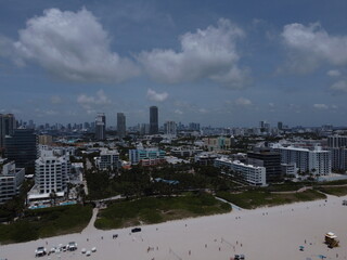 A stunning drone view of Miami Beach South Pointe showcasing the beach, park, and iconic skyline buildings.