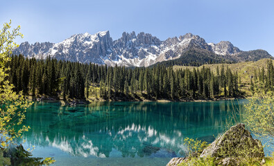 Scenic view on the mountain range of the Dolomites and the Karer Lake in Northern Italy