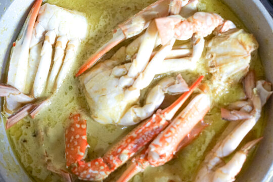 Close up of crab cooked in spicy coconut milk or Ketam Masak Lemak Cili Api.