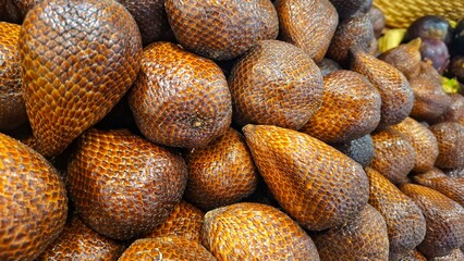 Exotic Salak fruit (snake fruit) from Indonesia. Discover this unique, sweet, and crunchy tropical delicacy. Perfect for healthy snacks! #Salak #SnakeFruit #IndonesianFruit #TropicalFruit #ExoticFruit