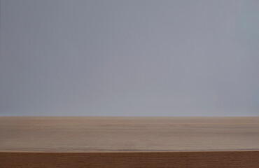 background with ight wooden table and blue wall