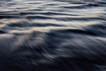 Close-up view of wave water flowing.
