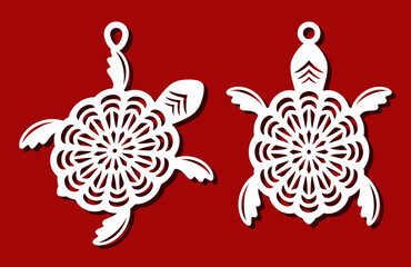 Set of white turtle pendants. Cute sea animals with a floral, plant pattern of shell. Template for plotter laser cutting of paper, fretwork, wood carving, metal engraving, cnc. Vector illustration.