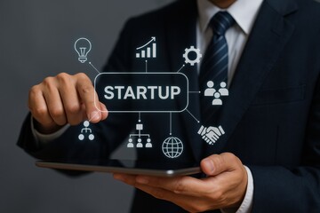 Person business suit holding tablet with startup icons and text