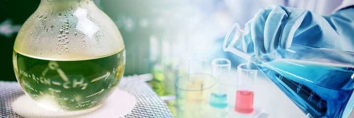 hand of scientist holding flask with lab glassware in chemical laboratory background, science...