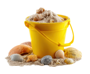 Yellow bucket filled with sand and seashells by the beach
