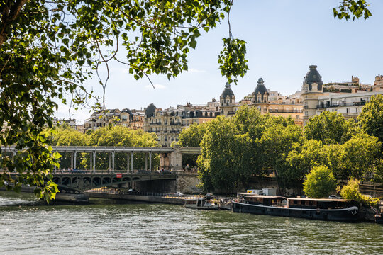 Scenic View of Seine River, Pont de Bir-Hakeim, and Parisian Buildings