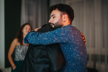 An emotional embrace between two close friends, expressing trust, love, and support in an indoor...