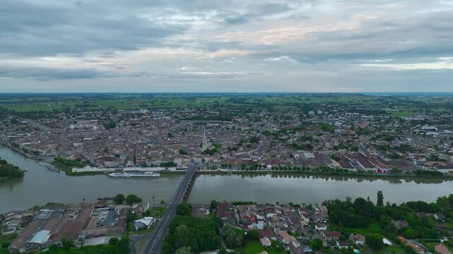 Twilight over Libourne from a drone, Gironde, Nouvelle-Aquitaine, Saint-&Eacute;milion and Pomerol, Southwestern France, Europe