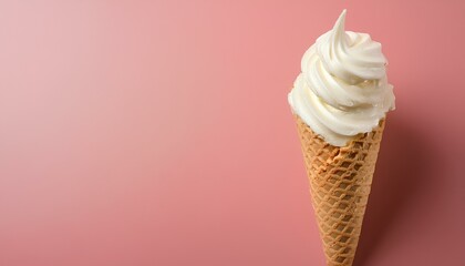 vanilla ice cream cone with on pink background with copy space
