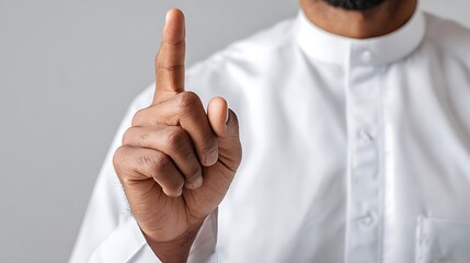 Close Up of a Muslim Finger Pointing Up : Suitable for Be Used in Blog Posts, Social Media Posts or Website Content Related to People, Culture and Religion Theme.