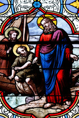 Saint-Pierre church.  Stained glass. Jesus. The miraculous catch. Chateau Chalon. France.
