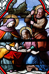 Saint-Pierre church.  Stained glass. Saint Anne teaching the young Virgin to read.  Chateau Chalon....