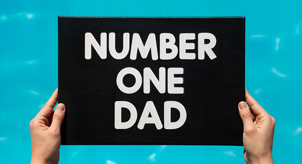 Number one dad sign by poolside