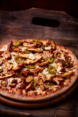 Gyros Pizza with jalapeno pepper and mozzarella cheese. Soft focus. Close up.	