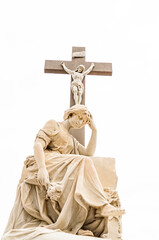 Marble statue of a woman at the feet of the crucified Christ,
on a tomb in the São João Batista Cemetery, Rio de Janeiro, Brazil.
It represents an expression of sadness, symbolizing the pain of death.