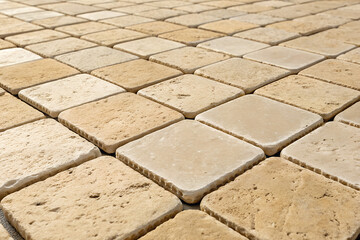 Beige Ceramic Tiles Covering A Room Floor Space