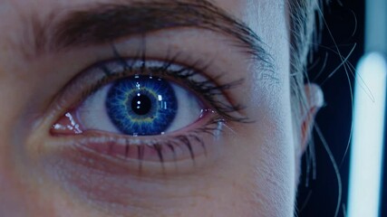 Futuristic eye AI technology scanning process with blue hologram interface. Futuristic, biometrics, security, circuitry elements - Powered by Adobe