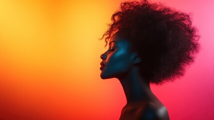 This artistic silhouette presents a woman in profile, her elegant features highlighted against a stunning gradient background of warm colors, evoking a sense of beauty and grace.