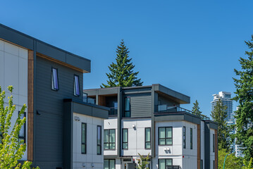 Top of modern apartment building with nice windows in Summer in Vancouver, Canada, North America. Day time on May 2025.