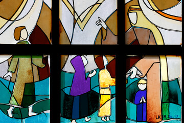 Kon Tum Cathedral, also known as Wooden Church.   Stained glass window. Let the Children Come to...
