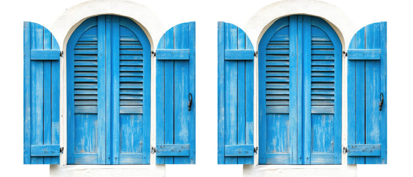 Two arch-top windows with blue shutters