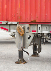 Semi truck trailer landing gear and crank.