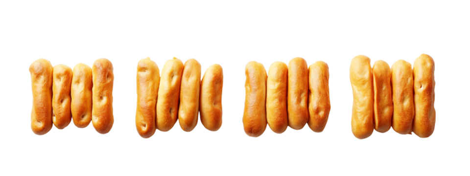 A row of bread sticks lined up against