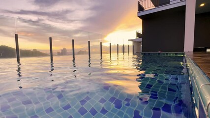 Stunning sunset over the city skyline from a rooftop pool in urban high-rise - Powered by Adobe