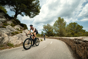 Cyclists on the road. Cycling in Mallorca. Mallorca is a popular island for cyclists